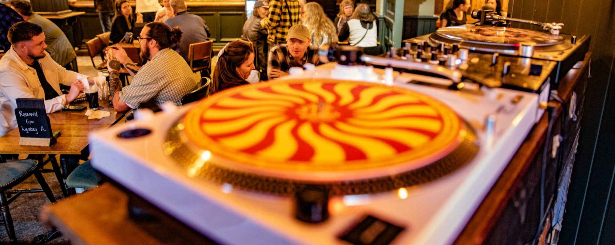 Vinyl playing in a busy Old King's Arms in Horsforth